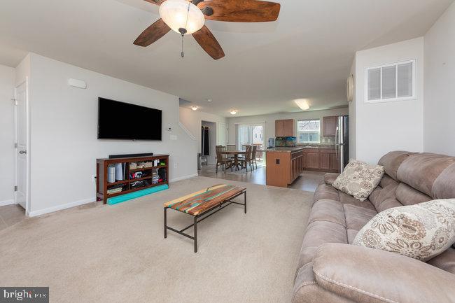 2082 Mallard Lane Locust Grove, VA 22508 - Photo 5 of 32 a living room with furniture and a flat screen tv