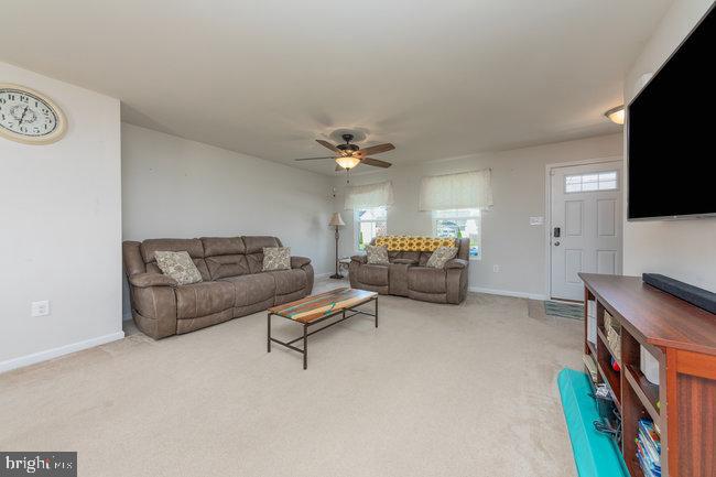 2082 Mallard Lane Locust Grove, VA 22508 - Photo 6 of 32 a living room with furniture and a flat screen tv