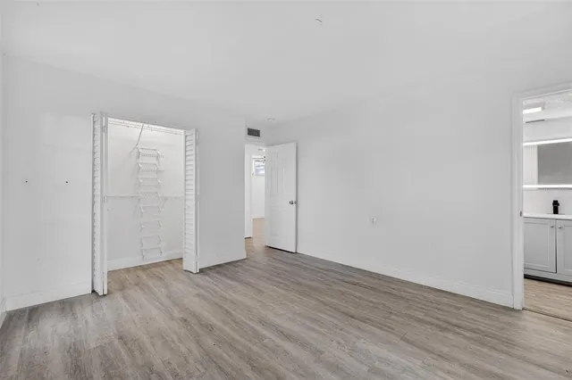 a bathroom with a bathtub and window