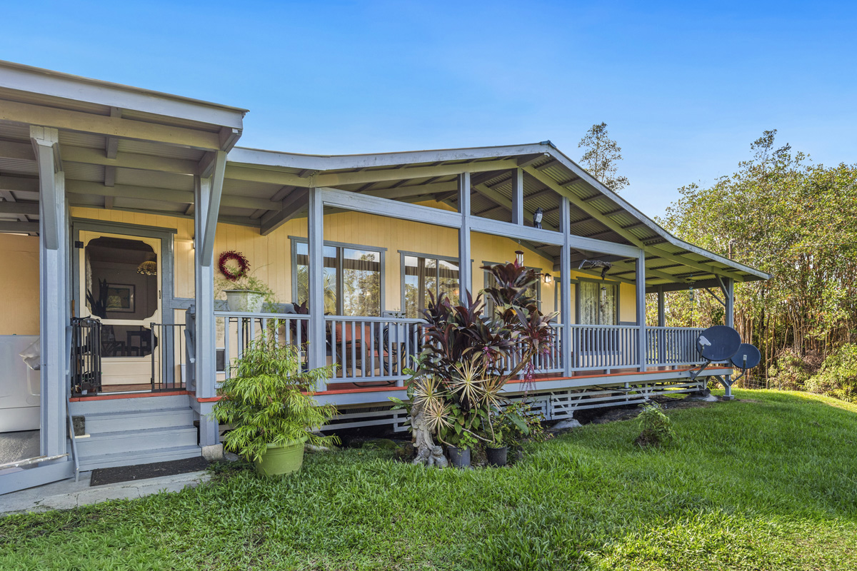 11-3545 Pikake Street Mountain View, HI 96771 - Photo 1 of 30 a house view with a garden space