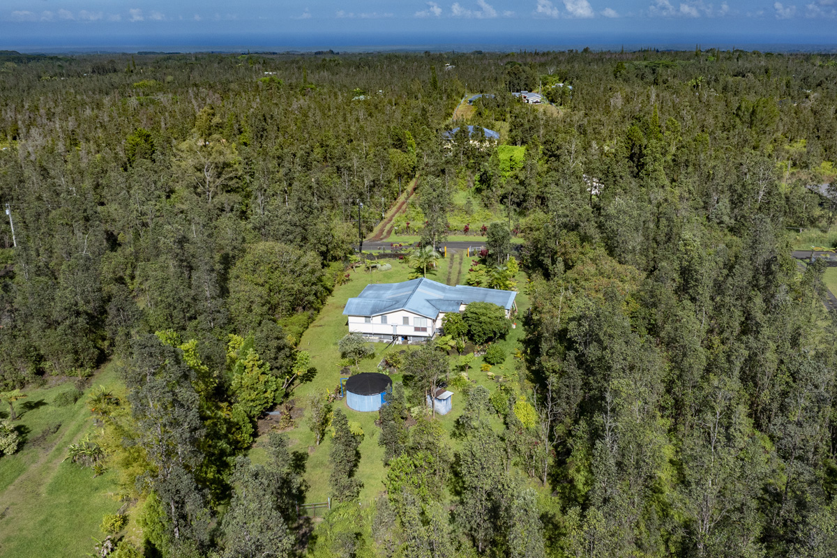 11-3545 Pikake Street Mountain View, HI 96771 - Photo 22 of 30 a view of a yard with an outdoor space