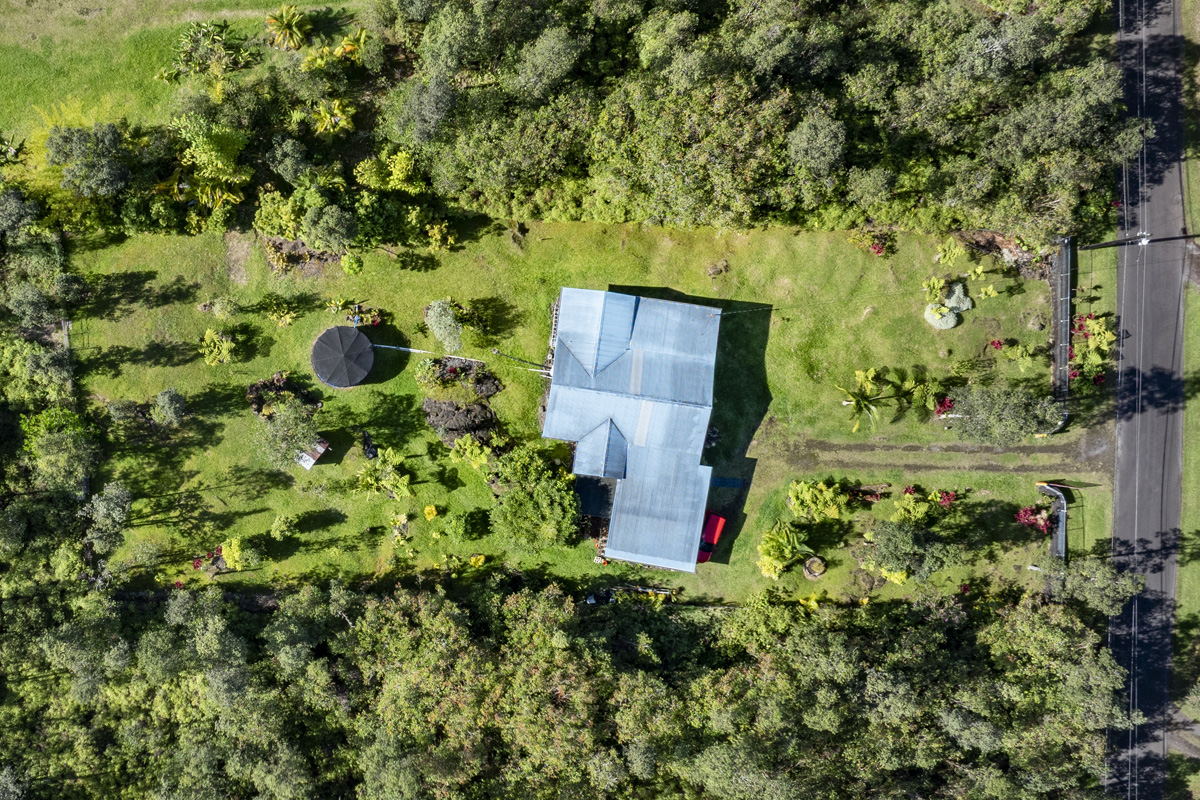 11-3545 Pikake Street Mountain View, HI 96771 - Photo 23 of 30 an aerial view of a house with large trees