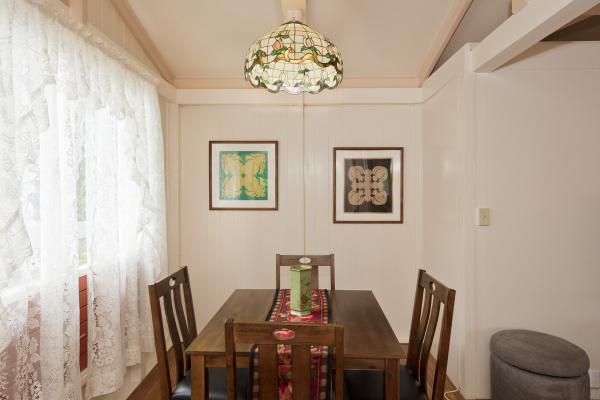 11-3545 Pikake Street Mountain View, HI 96771 - Photo 6 of 30 a view of a dining room with furniture and chandelier