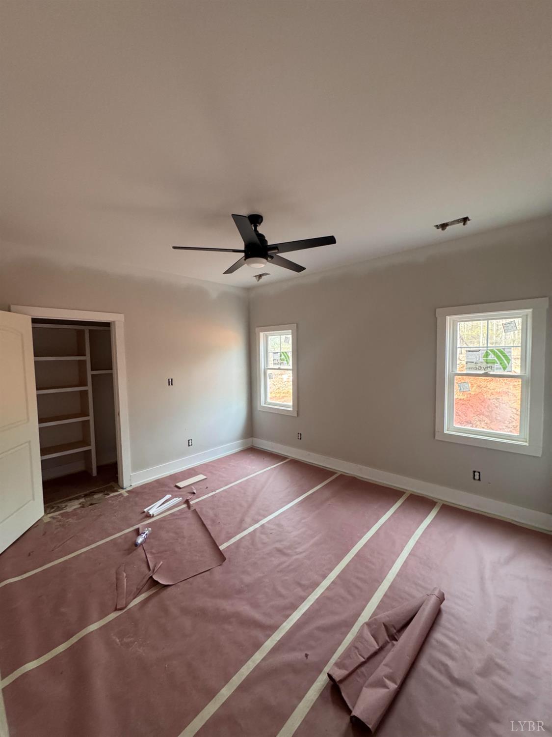 133 Deerfield Drive Amherst, VA 24521 - Photo 6 of 8 a view of an empty room with a window and wooden floor