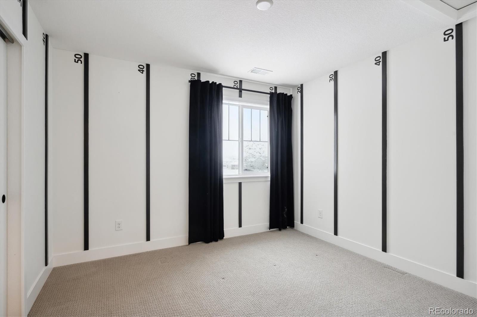 12841 Red Rosa Circle Parker, CO 80134 - Photo 18 of 29 a view of empty room with floor to ceiling window