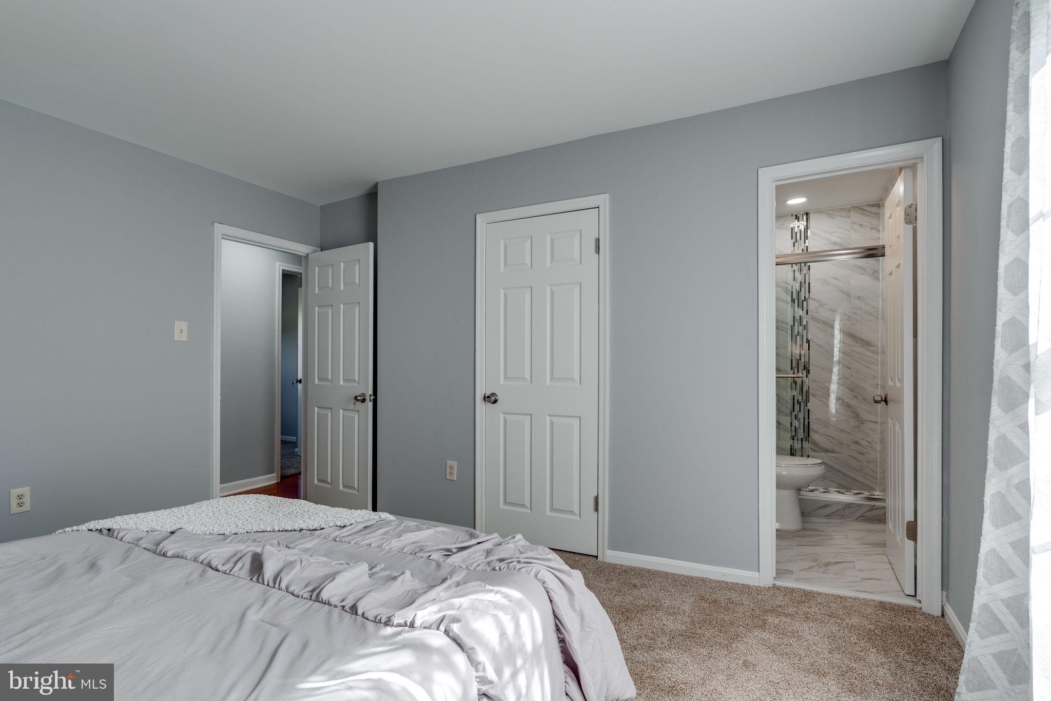 7107 Villa Park Road Springfield, VA 22150 - Photo 18 of 37 Primary Bedroom with Attached Bathroom