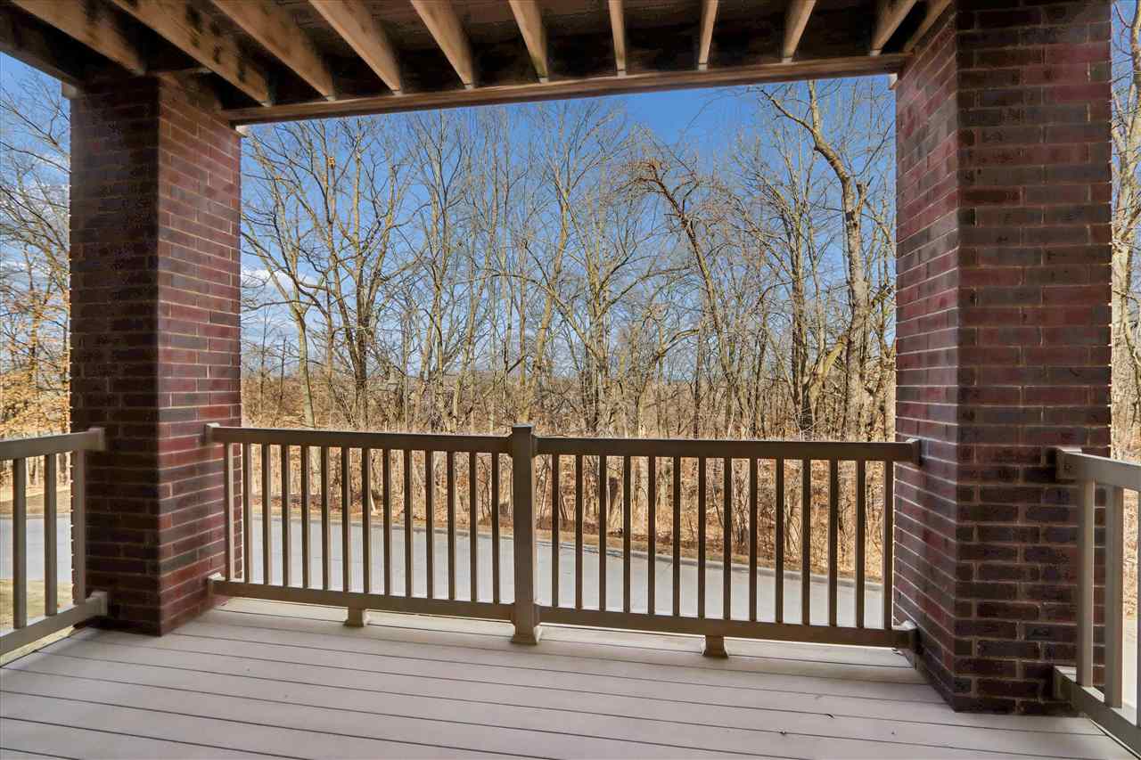 856 Foster Road Iowa City, IA 52245 - Photo 26 of 39 Deck and view of woods