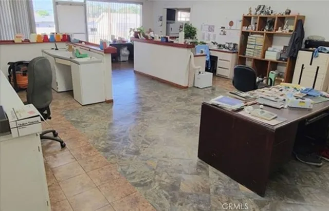 a room with a washing machine and sink