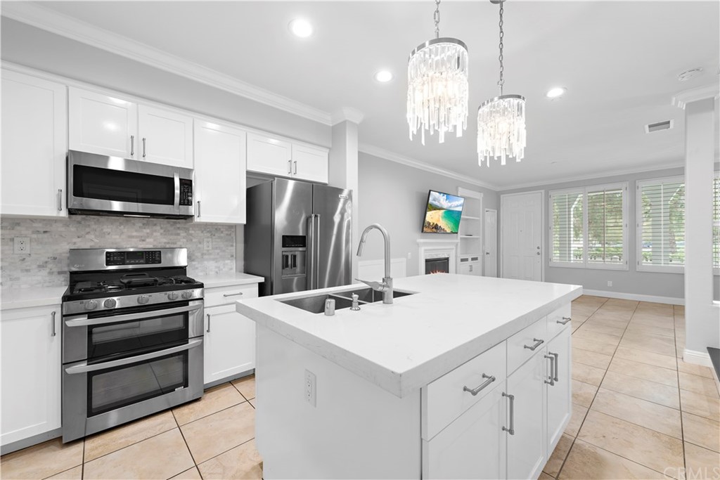 9 Platinum Circle Ladera Ranch, CA 92694 - Photo 1 of 1 a kitchen that has a lot of cabinets and stainless steel appliances