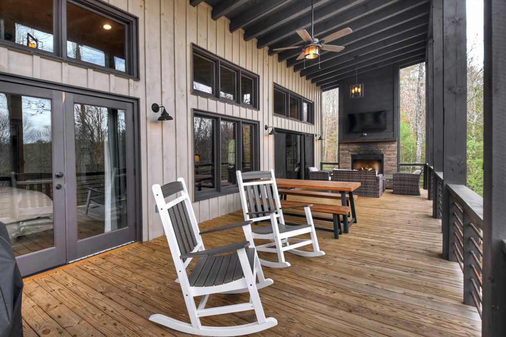 171 Cohutta Overlook Trail Blue Ridge, GA 30513 - Photo 26 of 47 a patio with table and chairs