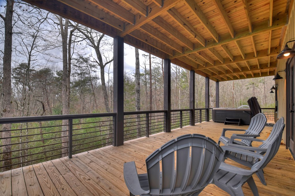 171 Cohutta Overlook Trail Blue Ridge, GA 30513 - Photo 40 of 47 a view of a balcony with chairs
