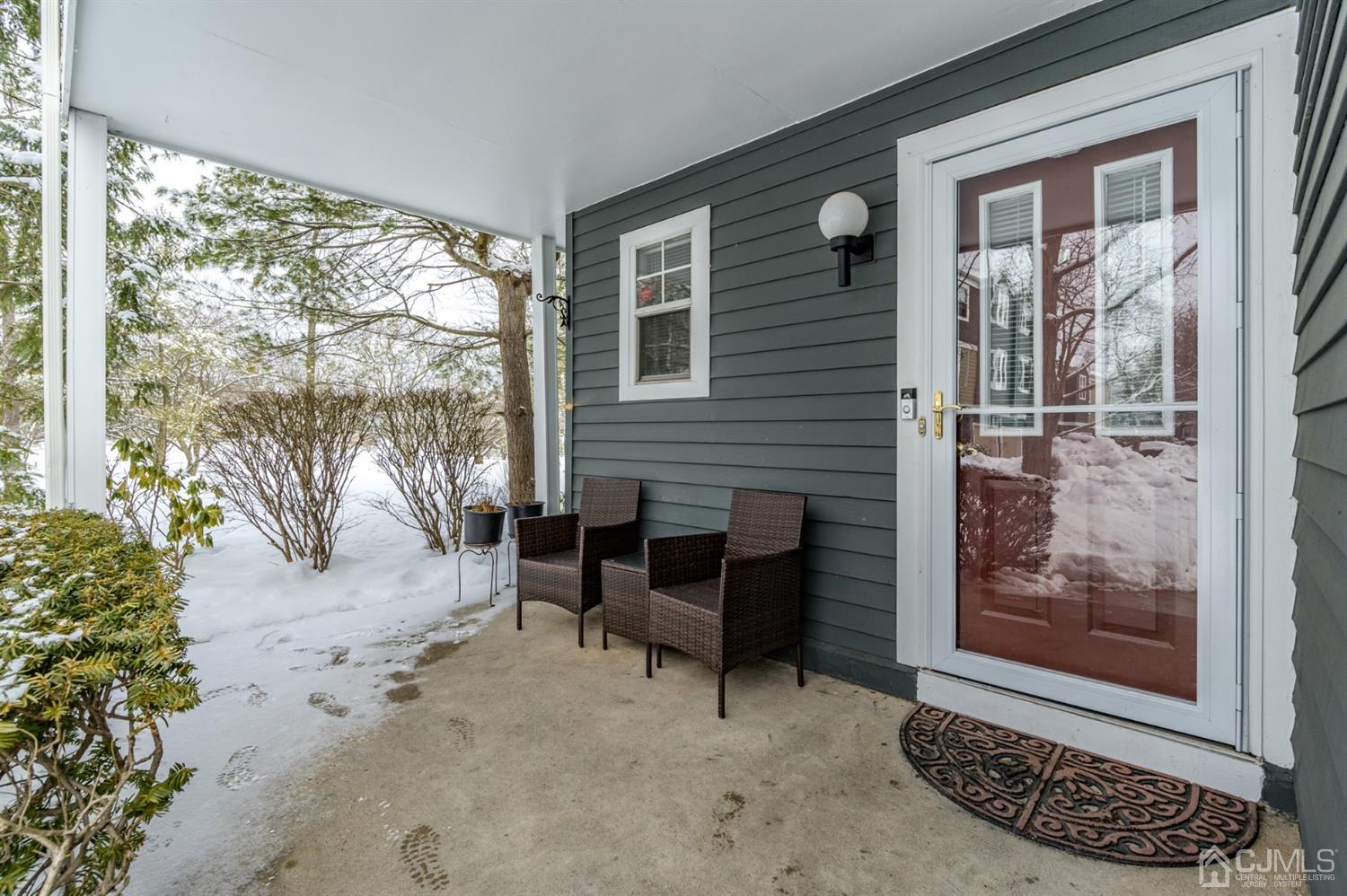 382 Waterview Road Bridgewater, NJ 08807 - Photo 2 of 30 a balcony with furniture and a potted plant