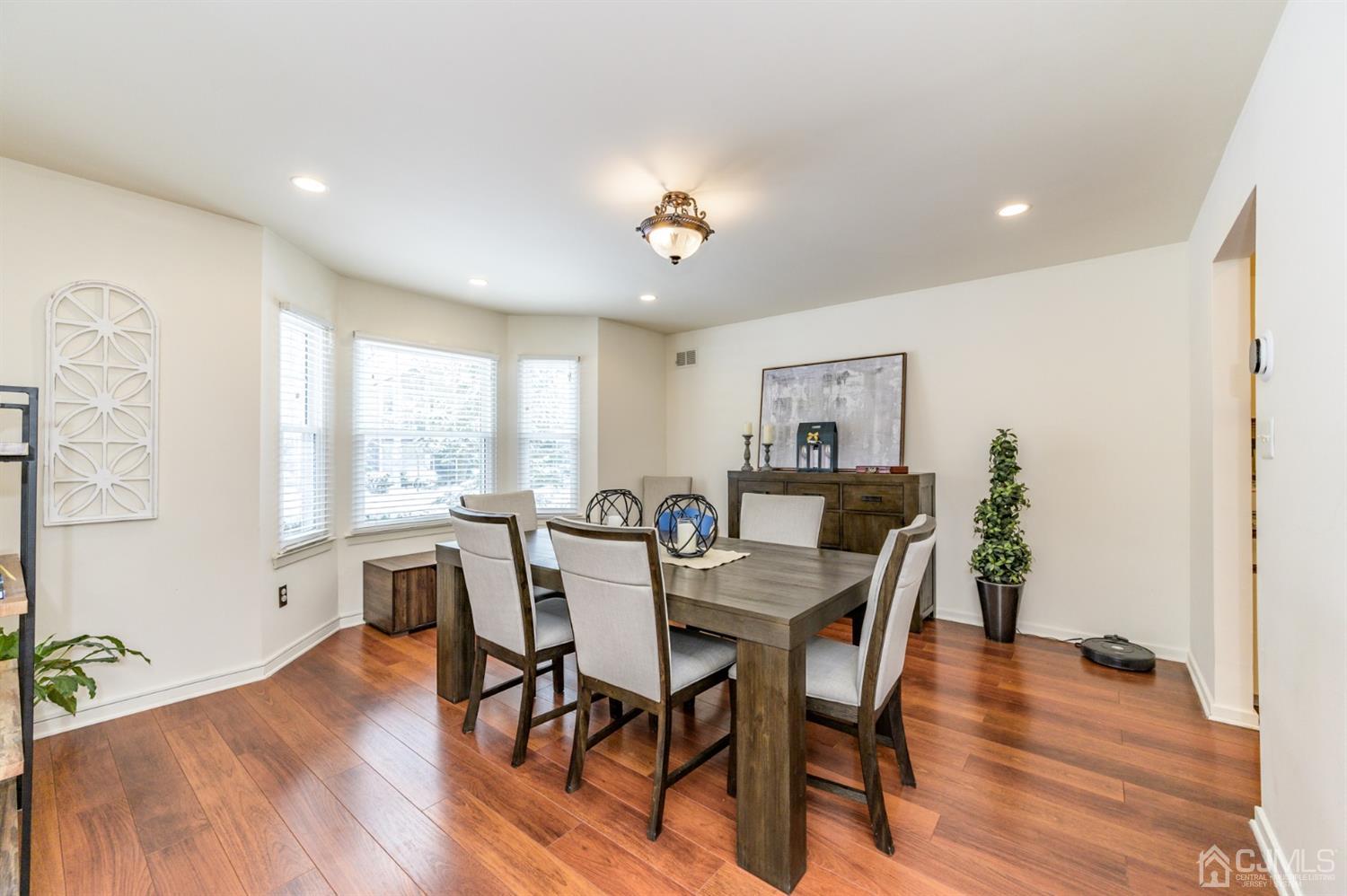 382 Waterview Road Bridgewater, NJ 08807 - Photo 11 of 30 a view of a dining room with furniture window and wooden floor