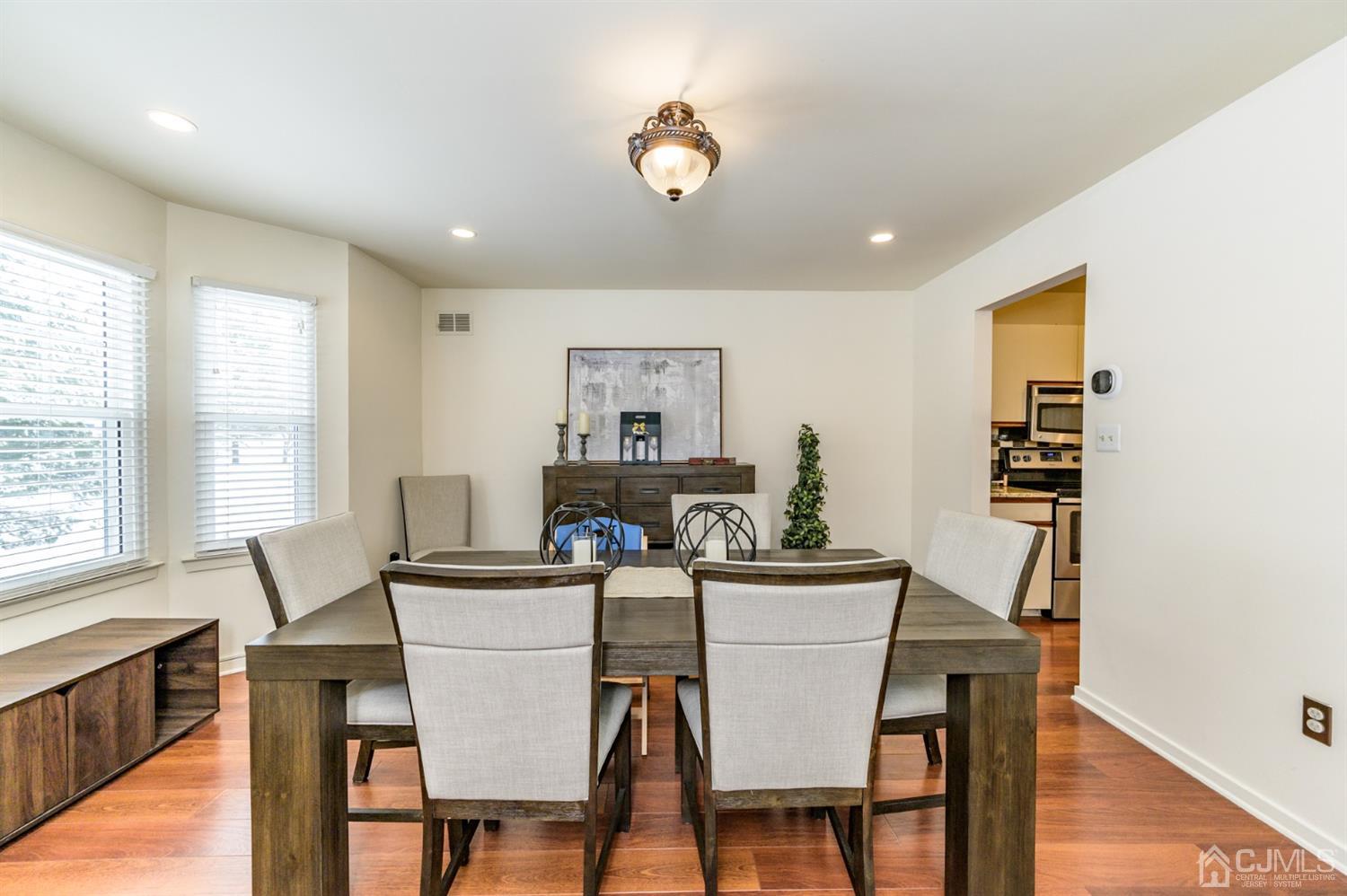 382 Waterview Road Bridgewater, NJ 08807 - Photo 13 of 30 a view of a dining room with furniture and a window