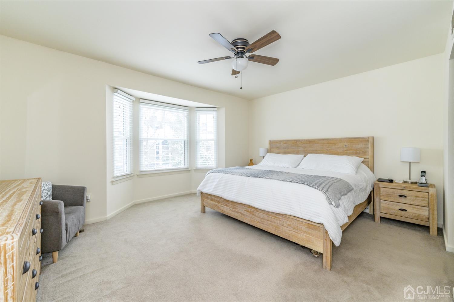 382 Waterview Road Bridgewater, NJ 08807 - Photo 15 of 30 a bedroom with a bed and a window
