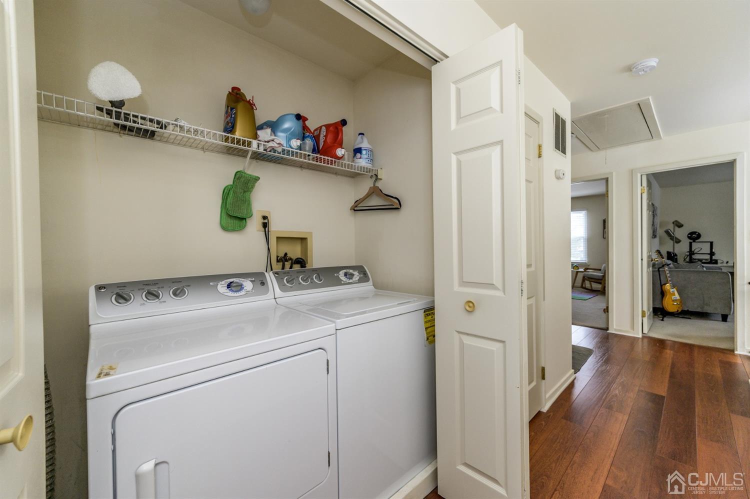 382 Waterview Road Bridgewater, NJ 08807 - Photo 20 of 30 a view of storage and utility room with washer and dryer