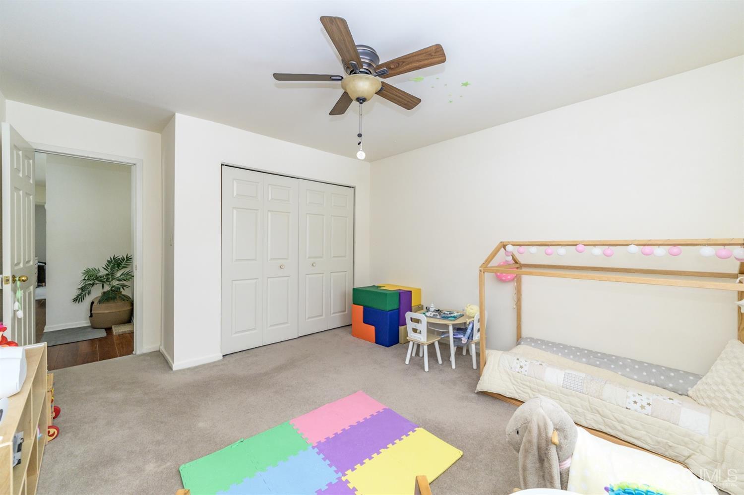 382 Waterview Road Bridgewater, NJ 08807 - Photo 22 of 30 a living room with a couch and a table