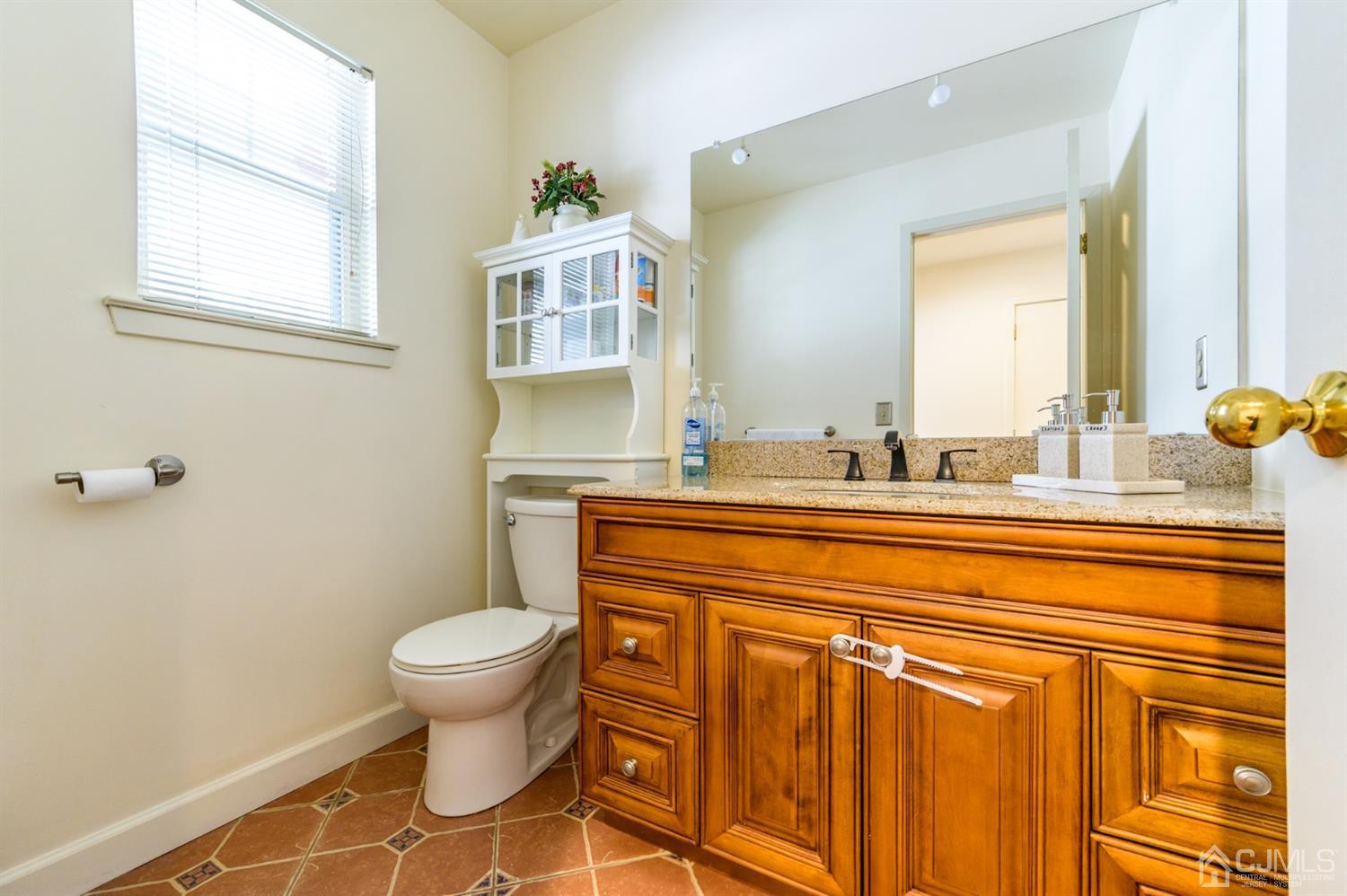 382 Waterview Road Bridgewater, NJ 08807 - Photo 4 of 30 a bathroom with a sink and a toilet