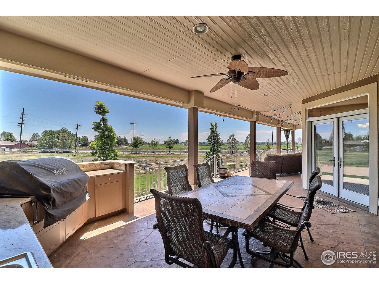 940 Goshawk Road Eaton, CO 80615 - Photo 36 of 40 Beautiful covered Deck w/outdoor kitchen