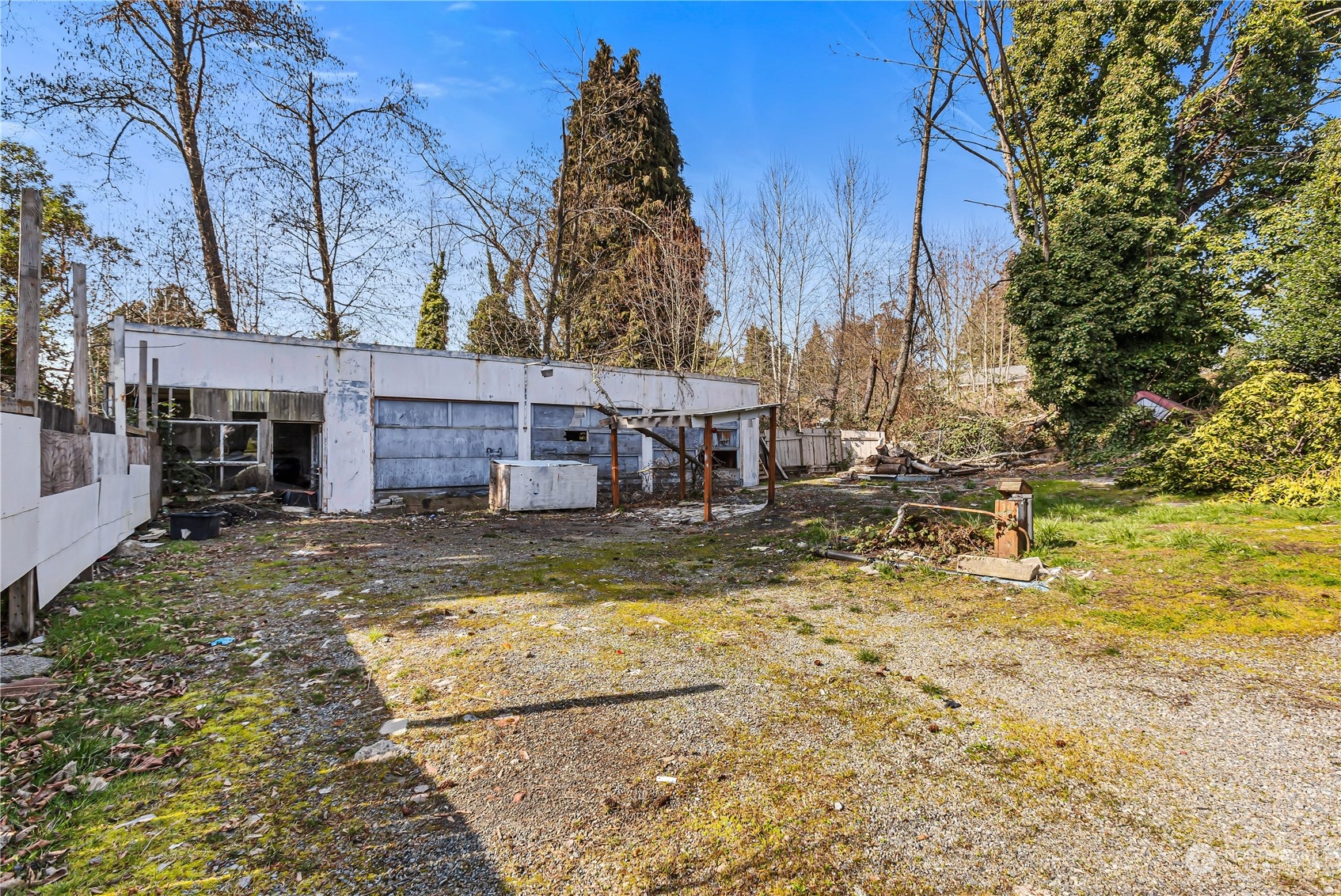 10057 24th Avenue Southwest Seattle, WA 98146 - Photo 18 of 23 front view of a house with a yard