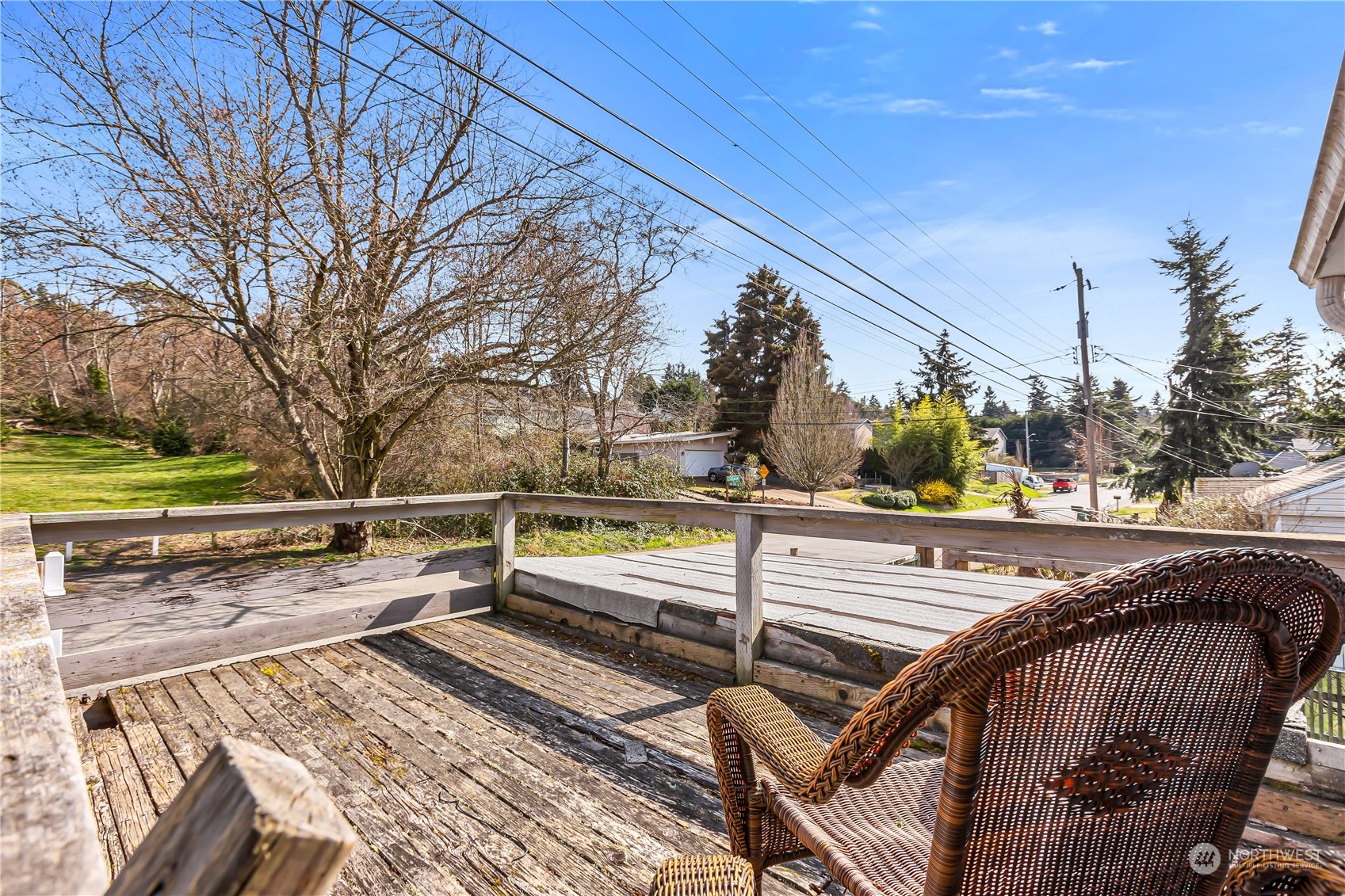 10057 24th Avenue Southwest Seattle, WA 98146 - Photo 2 of 23 a view of a balcony with chairs