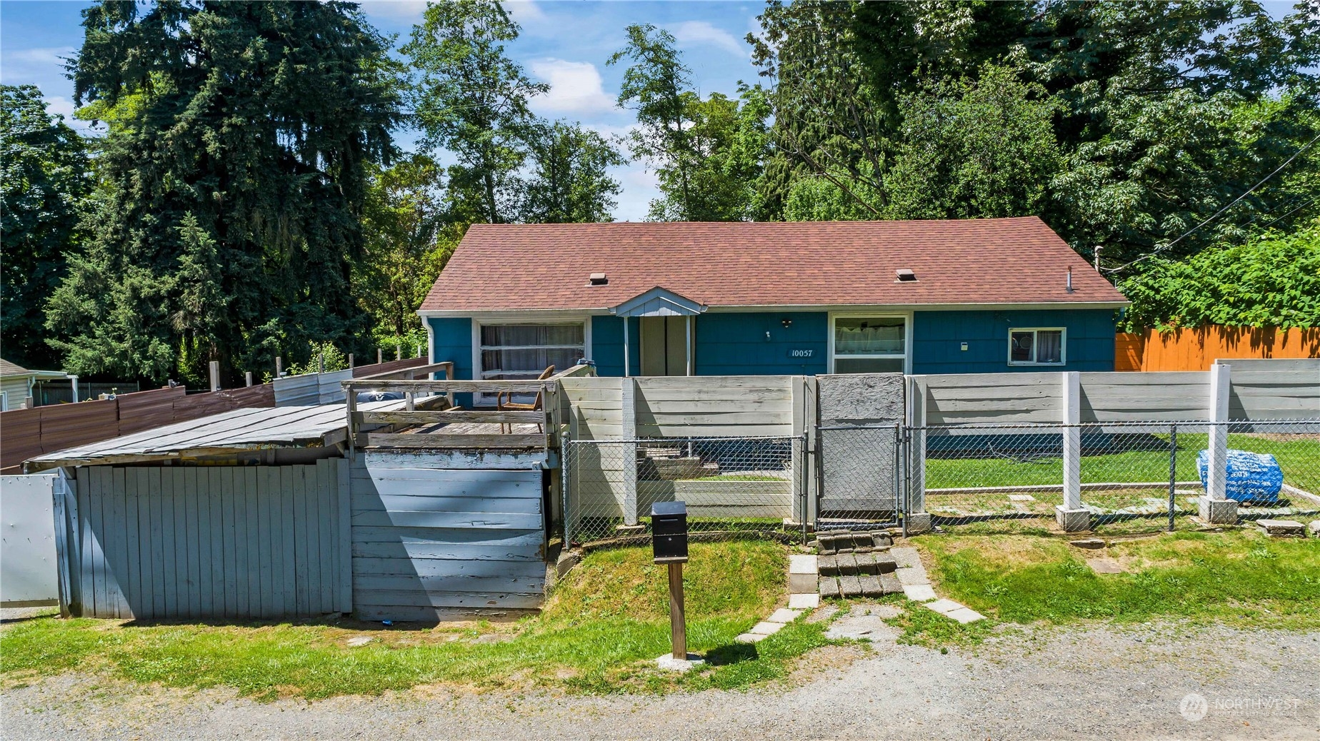 10057 24th Avenue Southwest Seattle, WA 98146 - Photo 3 of 23 a view of a house with backyard tub and sitting area