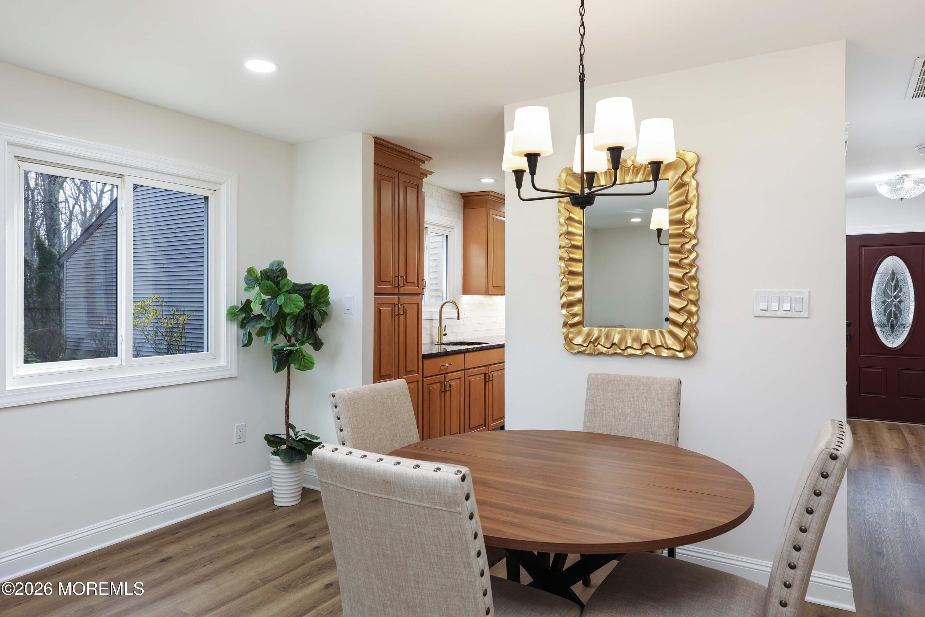 50 Hanover Court Red Bank, NJ 07701 - Photo 13 of 37 a living room with furniture and a potted plant