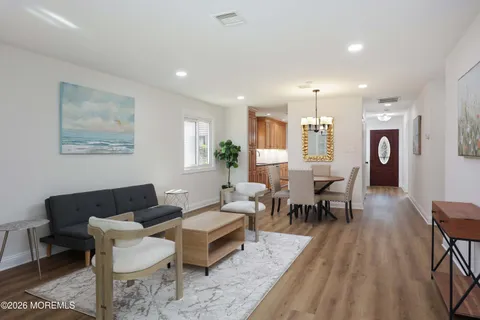 a living room with furniture and a table