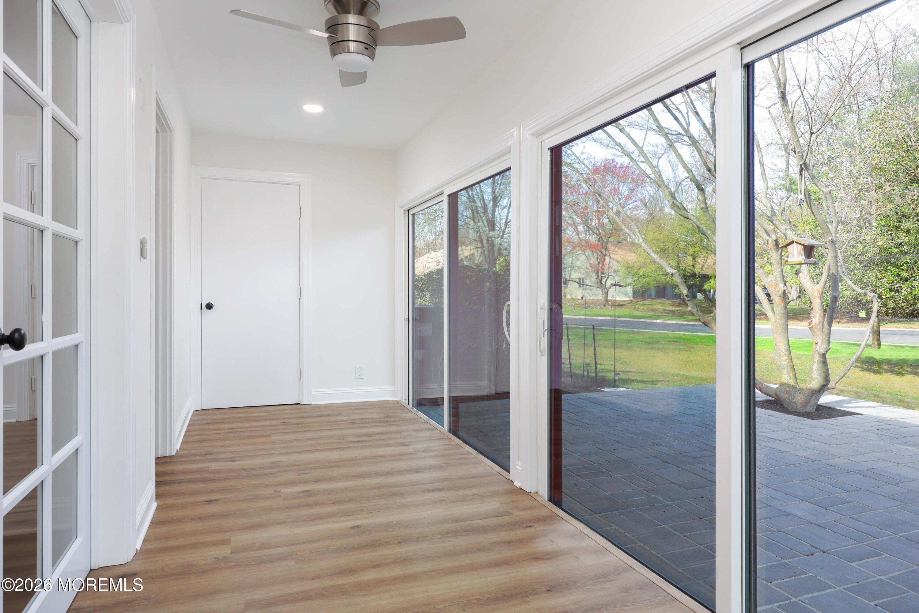 50 Hanover Court Red Bank, NJ 07701 - Photo 19 of 37 a view of a bedroom with wooden floor and balcony