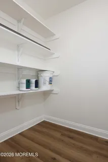 a view of small space with wooden floor