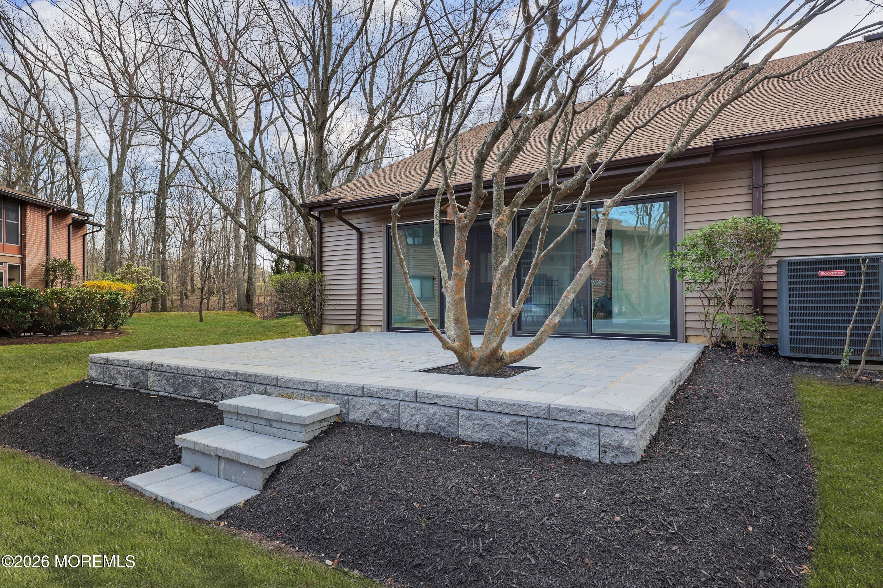 50 Hanover Court Red Bank, NJ 07701 - Photo 33 of 37 a front view of a house with garden