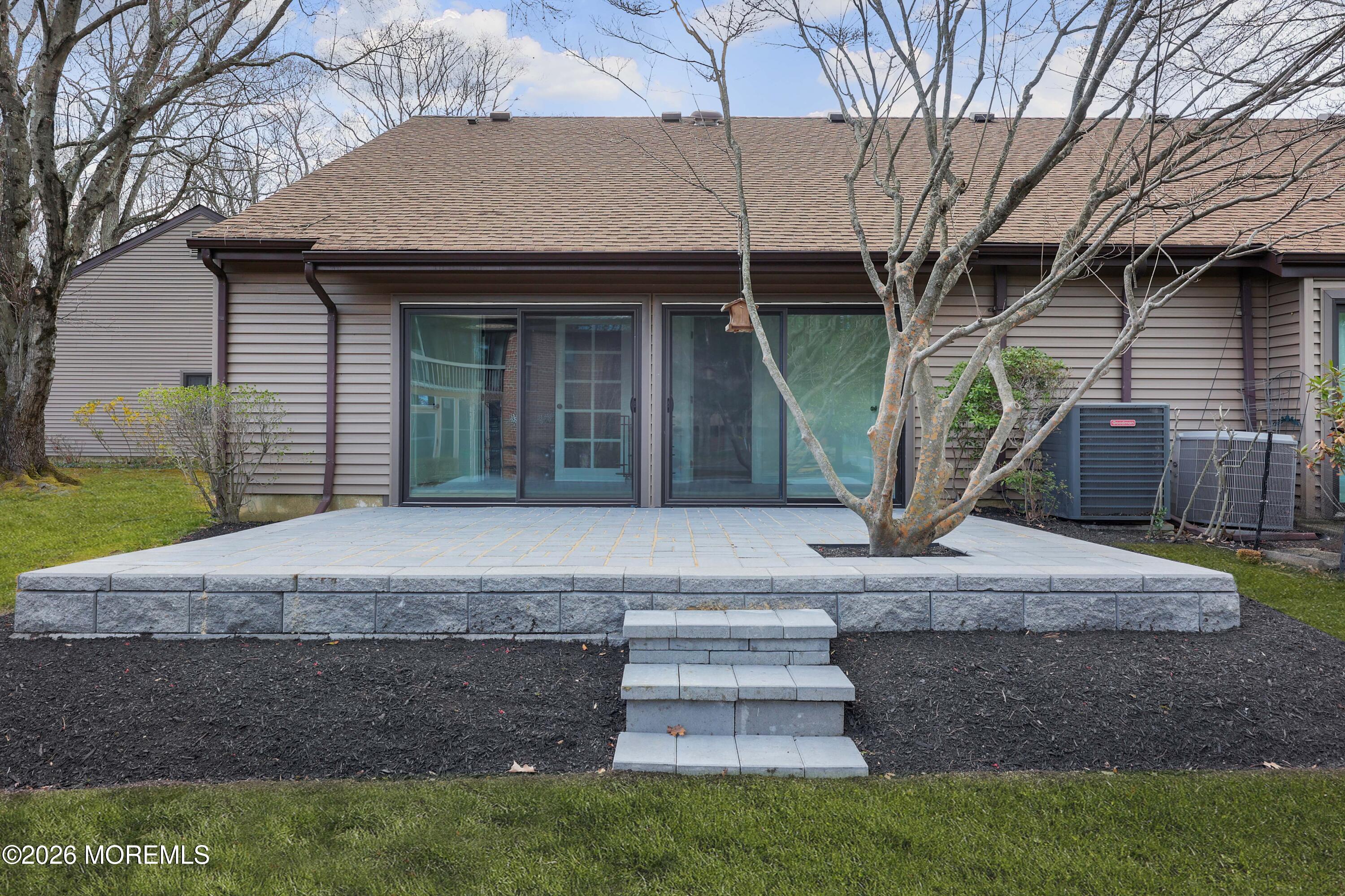 50 Hanover Court Red Bank, NJ 07701 - Photo 34 of 37 a front view of a house with garden