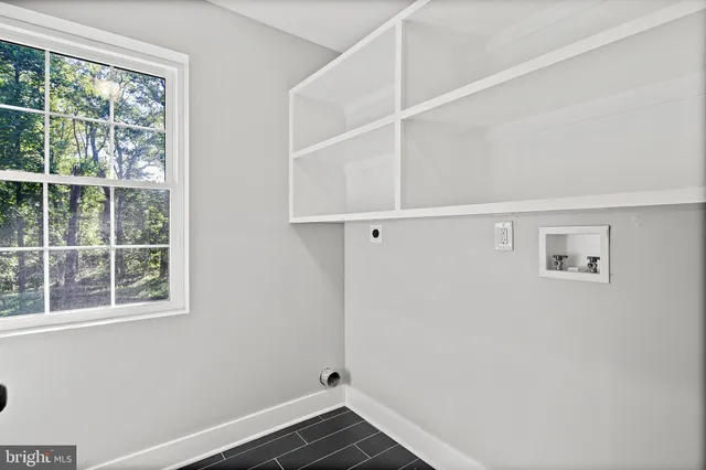 a view of a room with rack on the wall