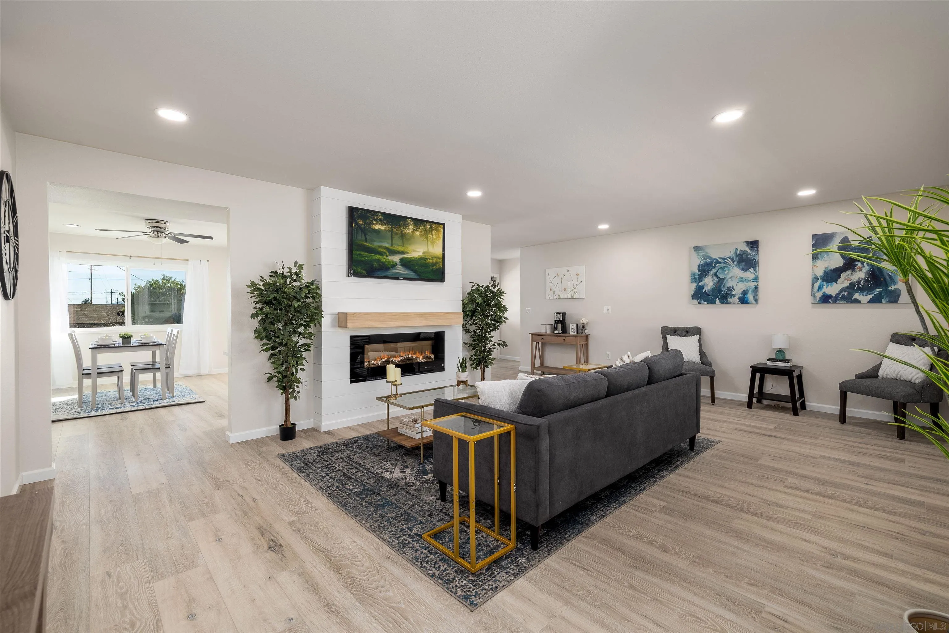 27431 El Rancho Road Menifee, CA 92586 - Photo 1 of 39 a living room with furniture a flat screen tv and a fireplace