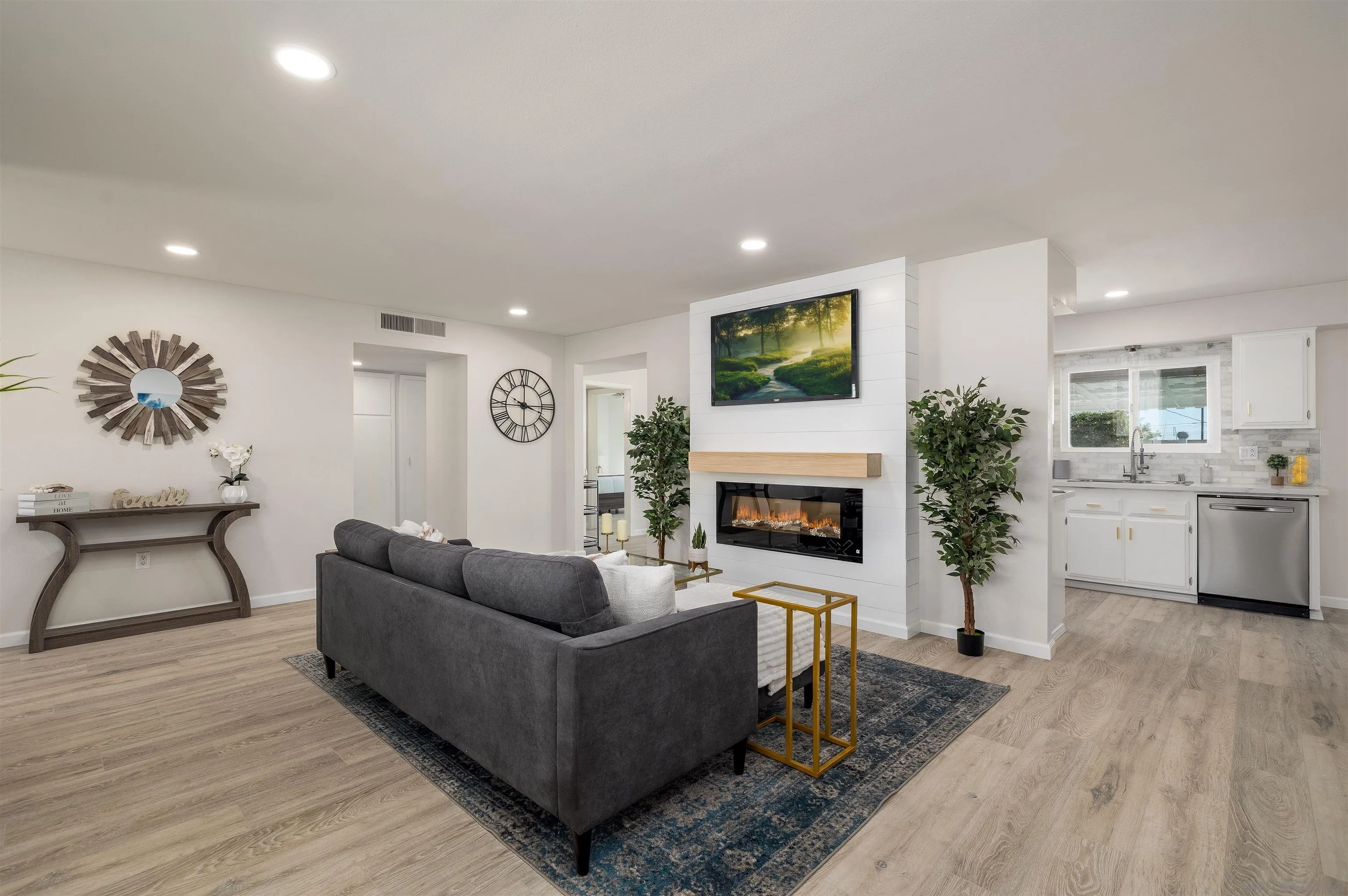 27431 El Rancho Road Menifee, CA 92586 - Photo 12 of 39 a living room with furniture and a fireplace