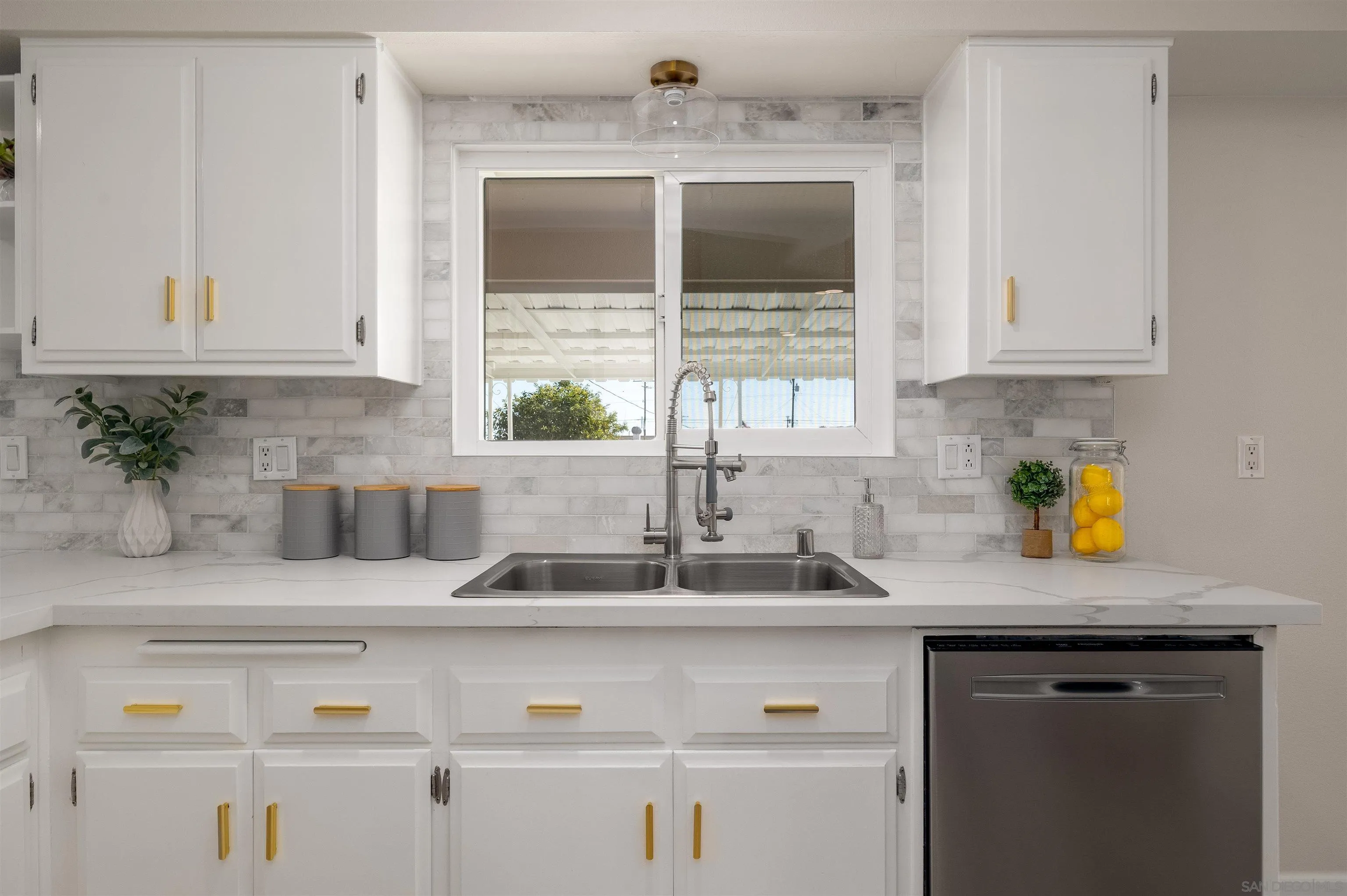 27431 El Rancho Road Menifee, CA 92586 - Photo 15 of 39 a kitchen with a sink and cabinets