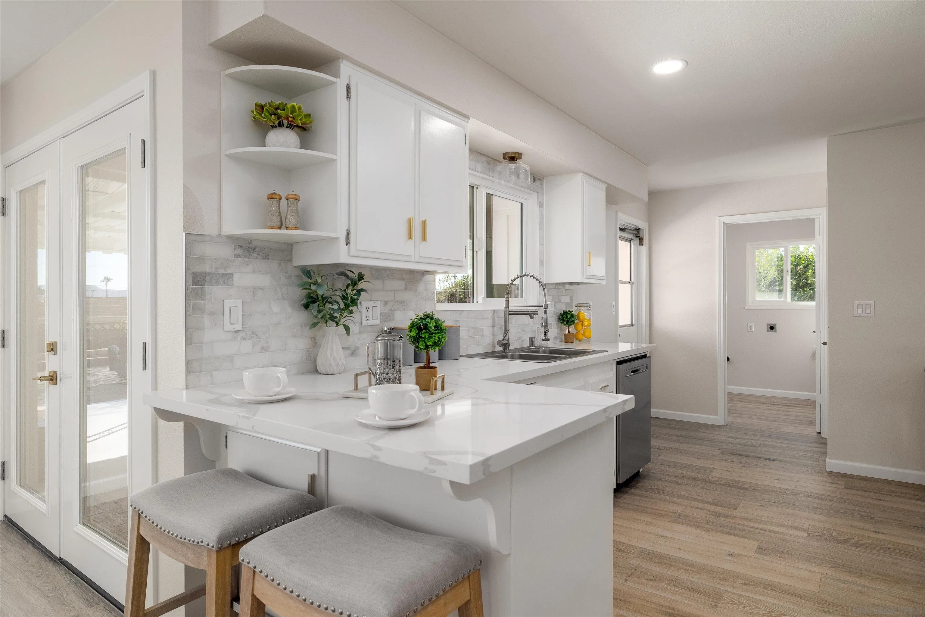 27431 El Rancho Road Menifee, CA 92586 - Photo 17 of 39 a kitchen with a table and chairs