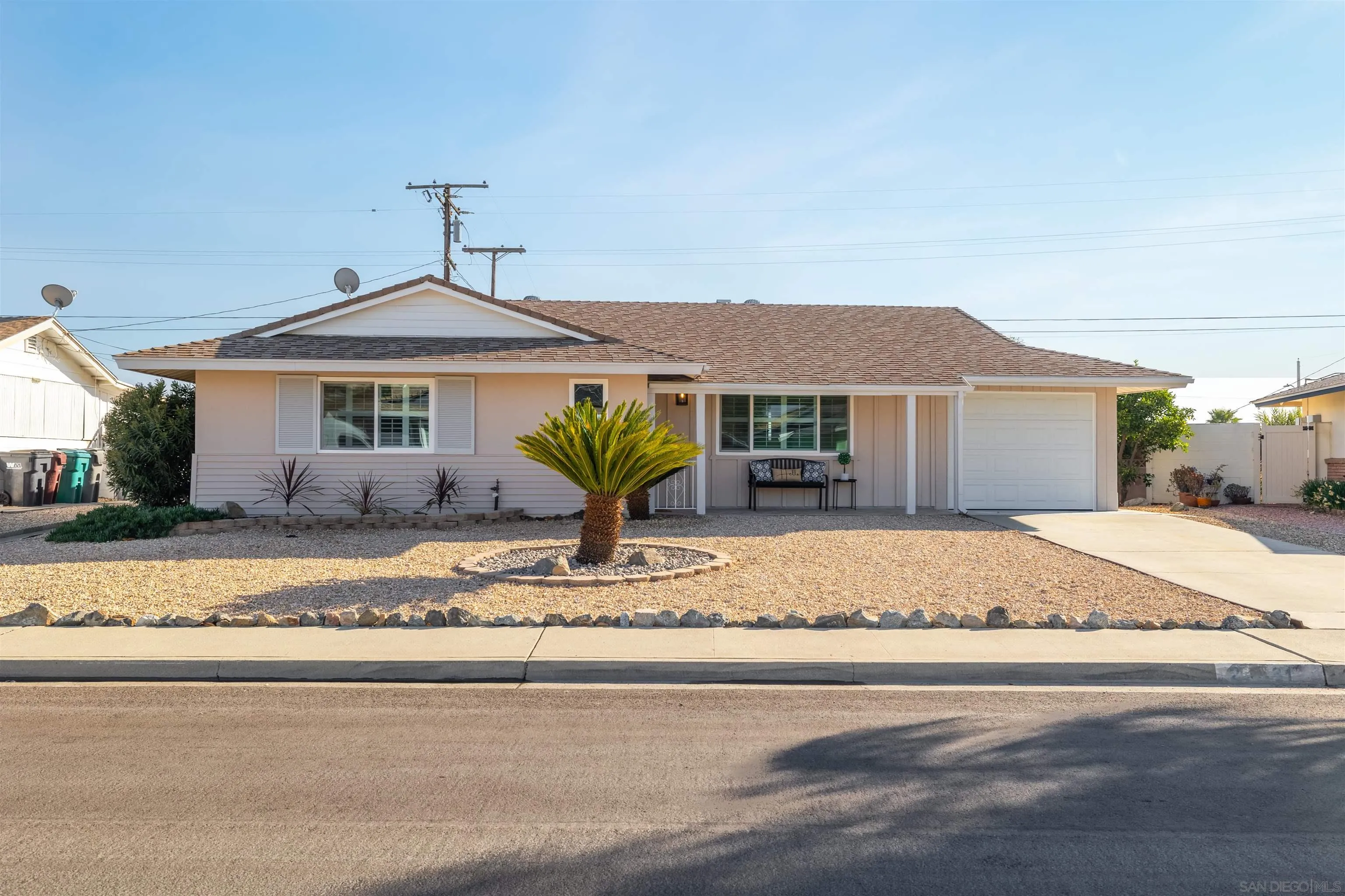 27431 El Rancho Road Menifee, CA 92586 - Photo 2 of 39 a front view of a house with a garden and patio