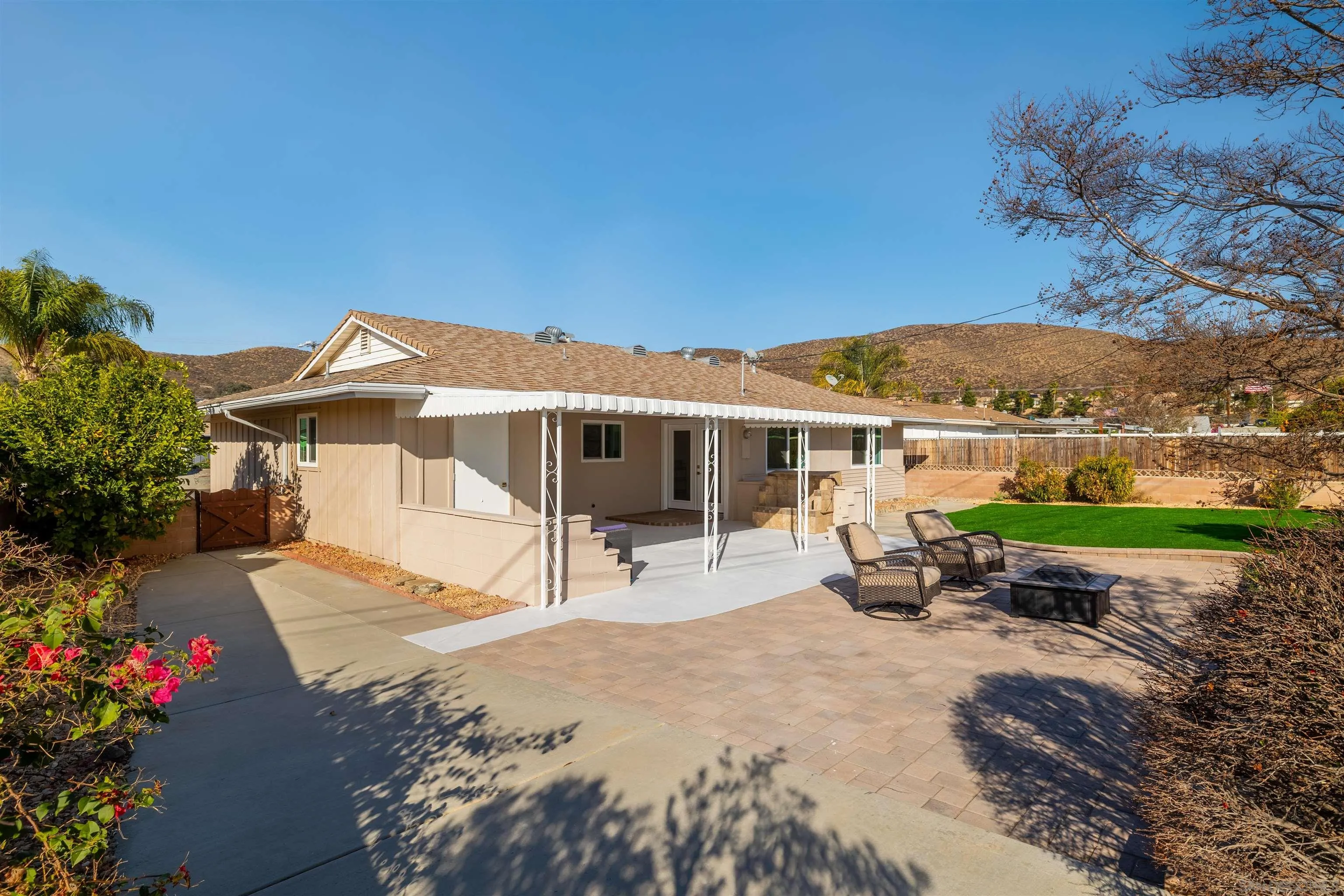 27431 El Rancho Road Menifee, CA 92586 - Photo 39 of 39 a view of a house with backyard sitting area and garden