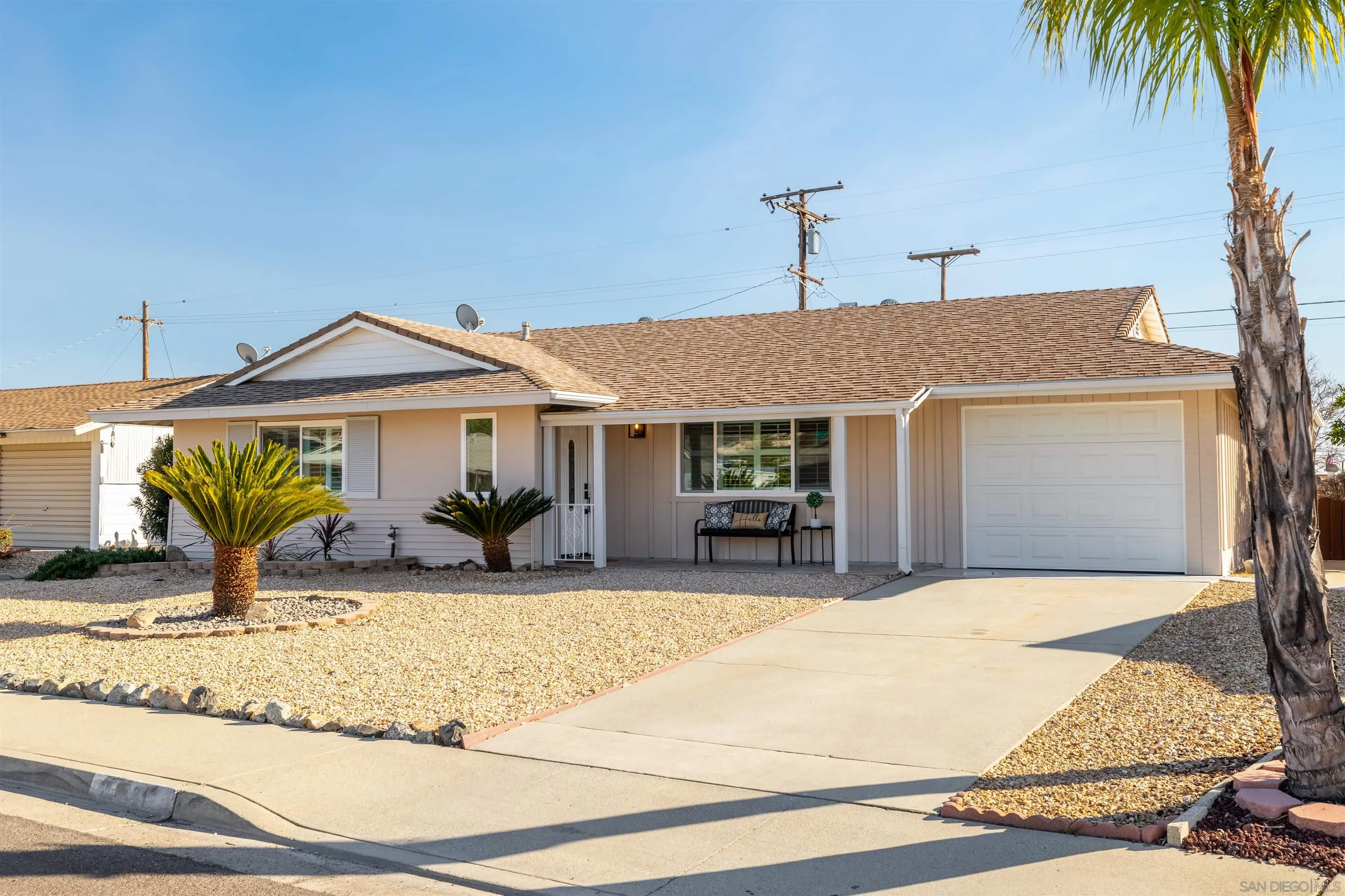 27431 El Rancho Road Menifee, CA 92586 - Photo 4 of 39 a front view of a house with a garden and patio