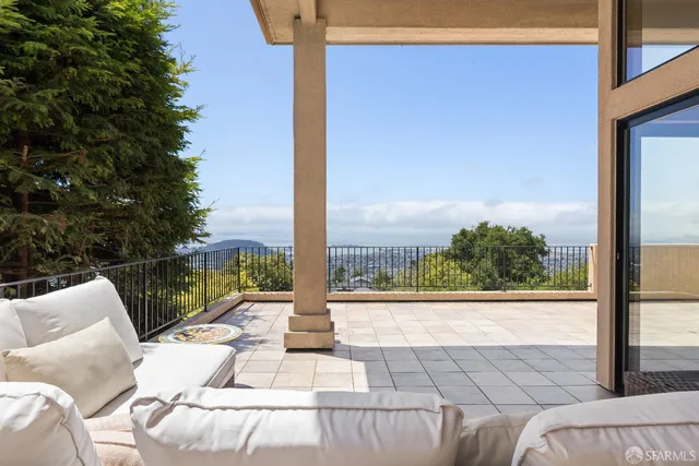 a view of balcony with patio