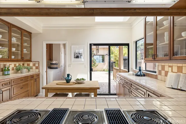 a living room with furniture and a table