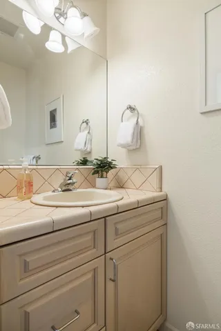 a bedroom with a large bed and a large window