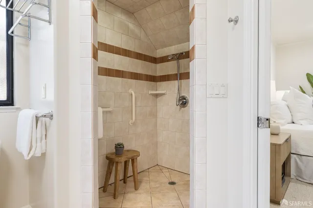 a bathroom with a double vanity sink mirror and double