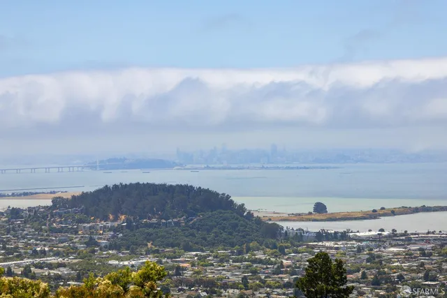 a view of a lake with a yard