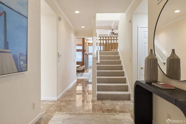 a view of entryway with wooden floor