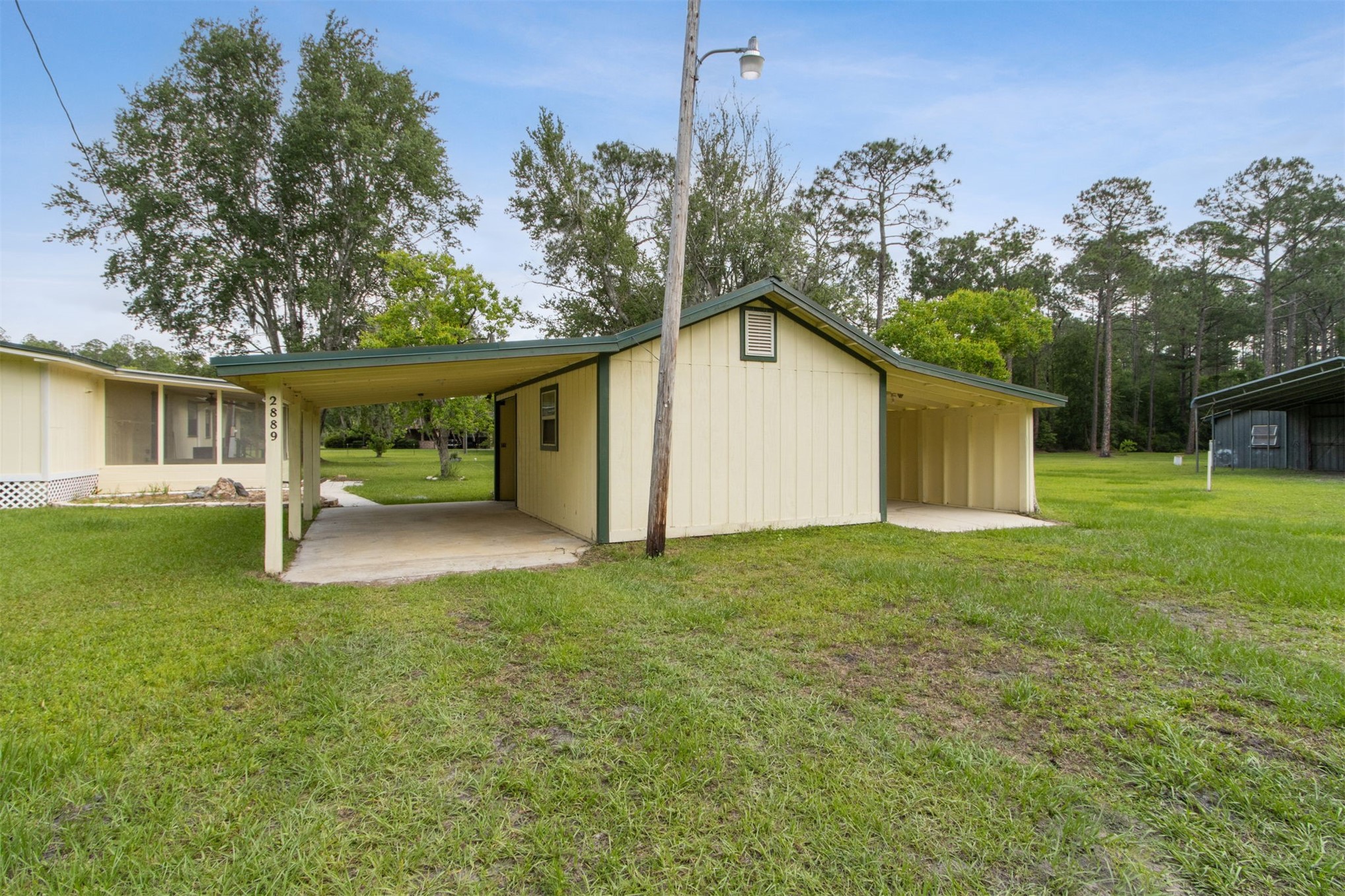 2889 Santa Fe Trail Hilliard, FL 32046 - Photo 10 of 48 CARPORT NEAR MAIN HOME