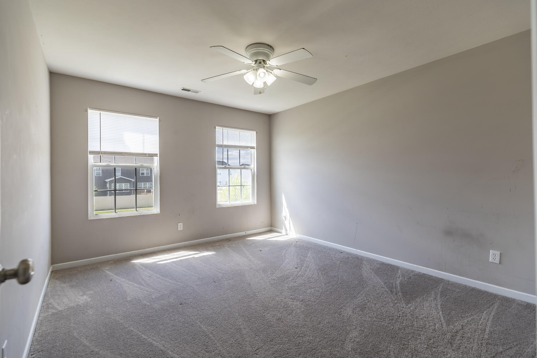 11527 Rhode Island Street Crown Point, IN 46307 - Photo 11 of 17 a view of an empty room with a window