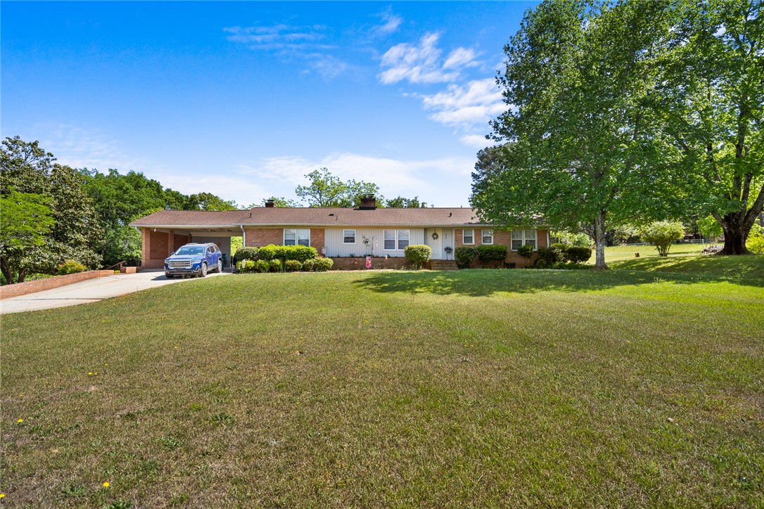 636 College Street Central, SC 29630 - Photo 1 of 2 This classic brick ranch home offers comfortable living and a spacious front yard.