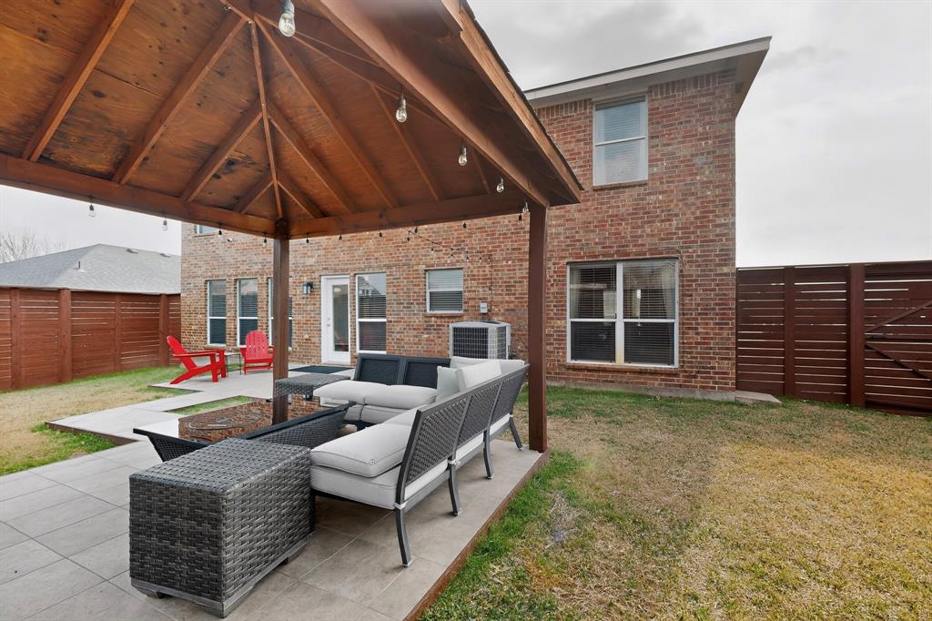 3825 Clay Mathis Road Mesquite, TX 75181 - Photo 33 of 39 a view of a house with backyard and porch